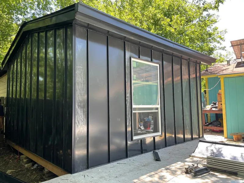 Black standing seam metal wall panels for Metal Roof Installation in Milton